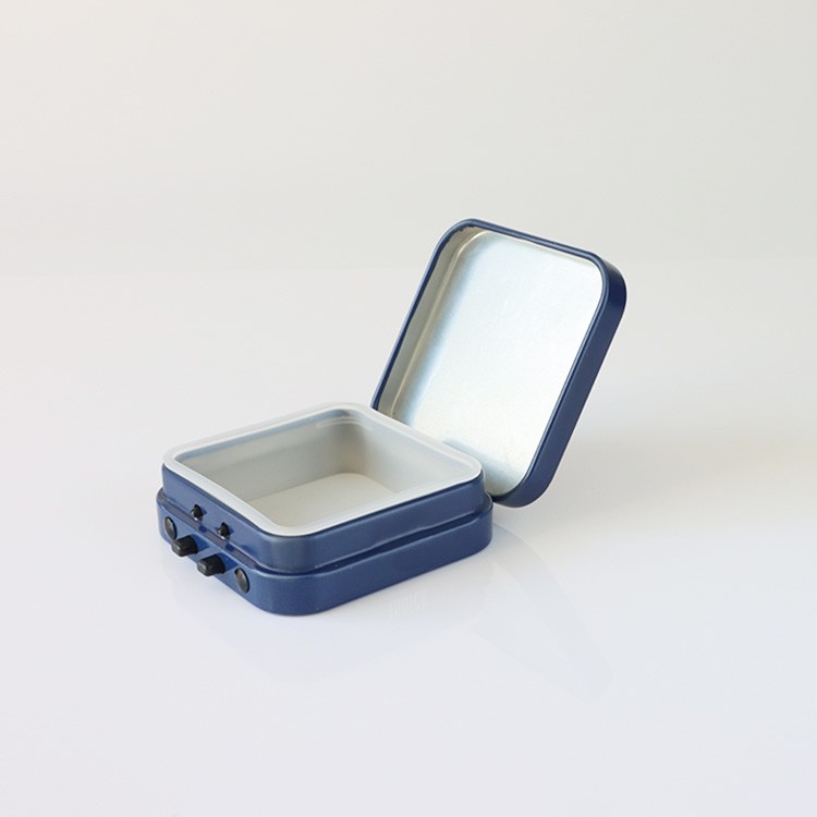 Square tin boxes with lids are often available in a silver color, which is the natural color of tin.